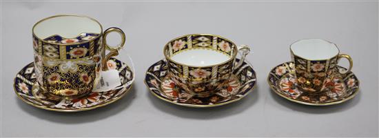 Three Royal Crown Derby cups and saucers